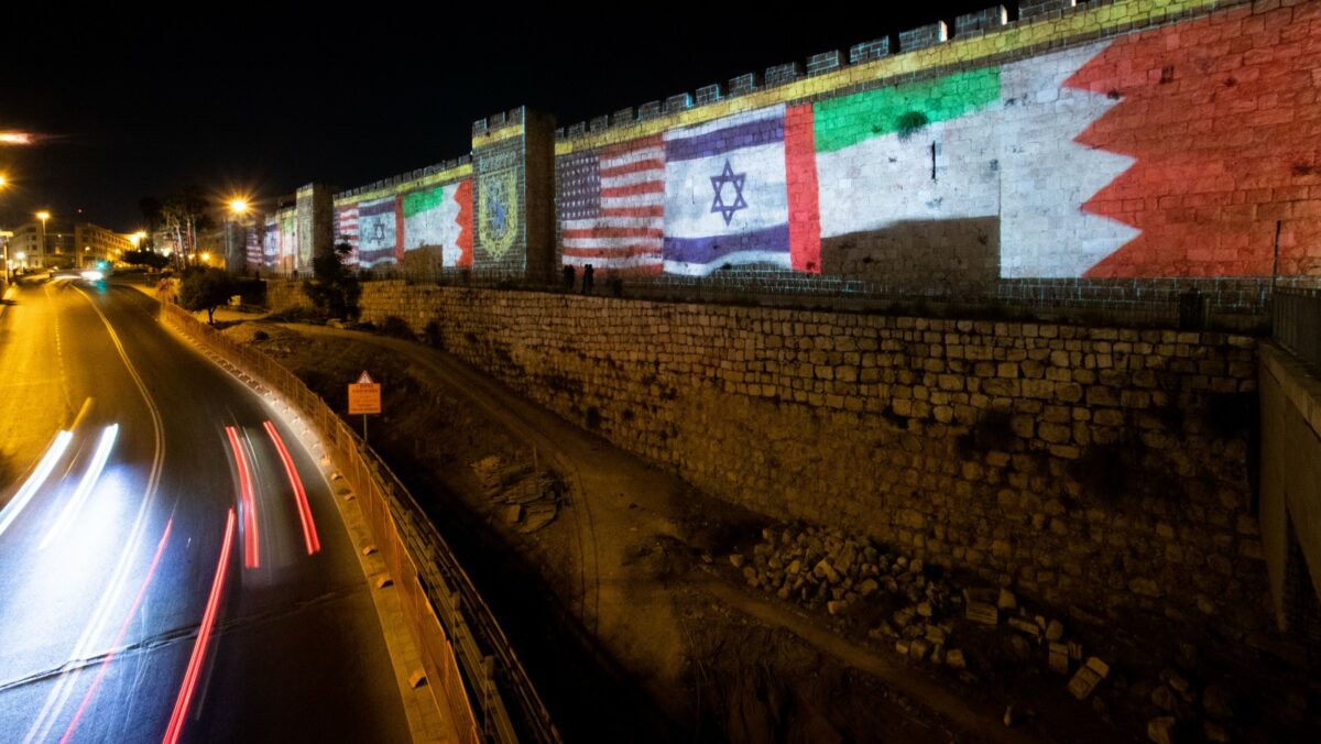 The Flags of US, United Arab Emirates, Israel & Bahrain are screened on the walls of Jerusalem's Old City