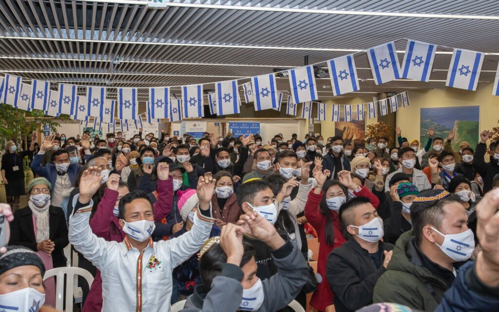 The new Bnei Menashe immigrants undergo a quick absorption process at the airport. Photo by Eleonora Shiluv. Image courtesy of the Ministry of Aliyah and Integration

