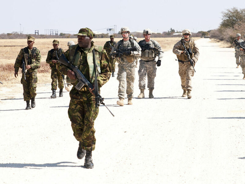 Cpl. Mmolawa Kgabo leads an element composed of fellow Botswana Defense Force members, Army Soldiers from the 1st Battalion 114th infantry company and Marines from Co. D Anti- Terrorism Battalion 4th Marine Division, on a training exercise designed to let them set up and carry out an ambush against fellow class mates.