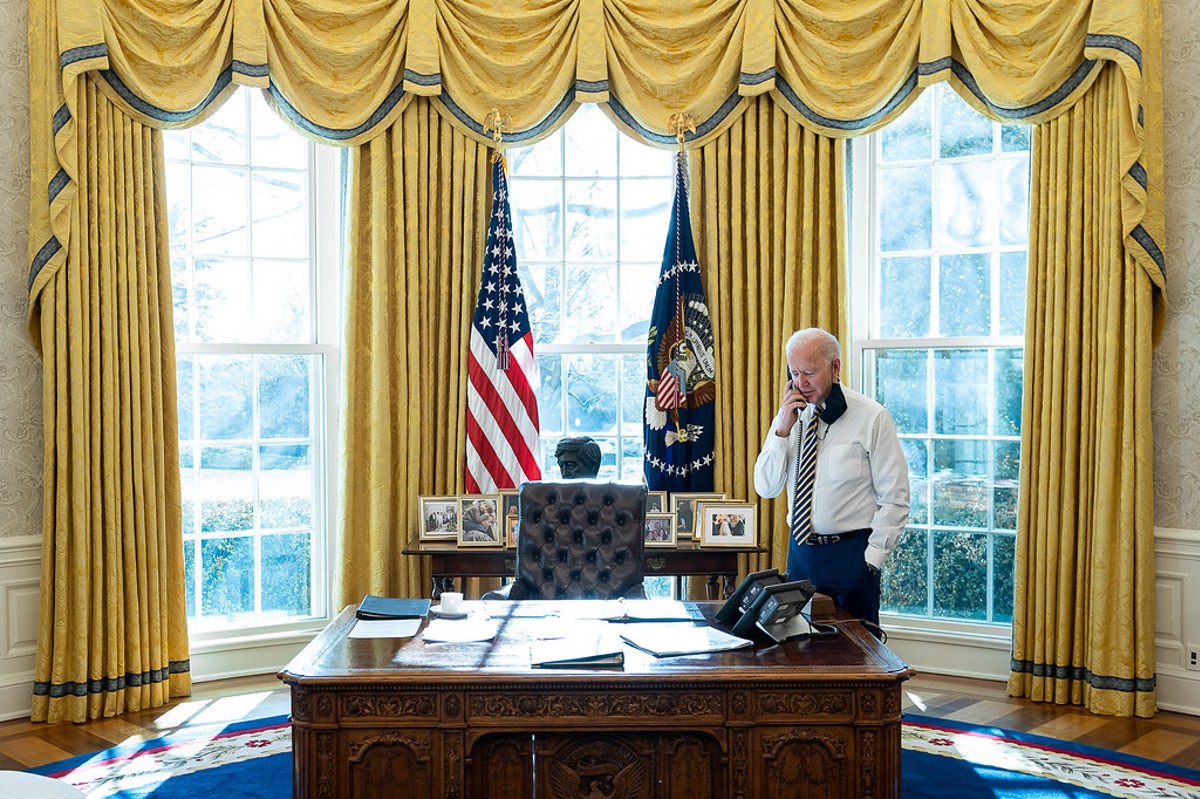 U.S. President Joe Biden talks on the phone with Mexico’s President Andrés Manuel López Obrador in the Oval Office of the White House on Jan. 22, 2021. Credit: Official White House Photo by Adam Schultz.