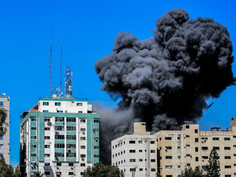 Smoke rising from the Al-Jalaa tower in Gaza after an Israeli airstrike on the building, which housed Hamas operatives and several media outlets, including the "Associated Press" and "Al Jazeera," May 15, 2021. Photo by Atia Mohammed/Flash90.