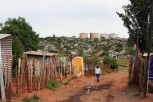 Poverty-stricken area of Soweto, Gauteng; By Richard IJzermans, commons, Flickr.