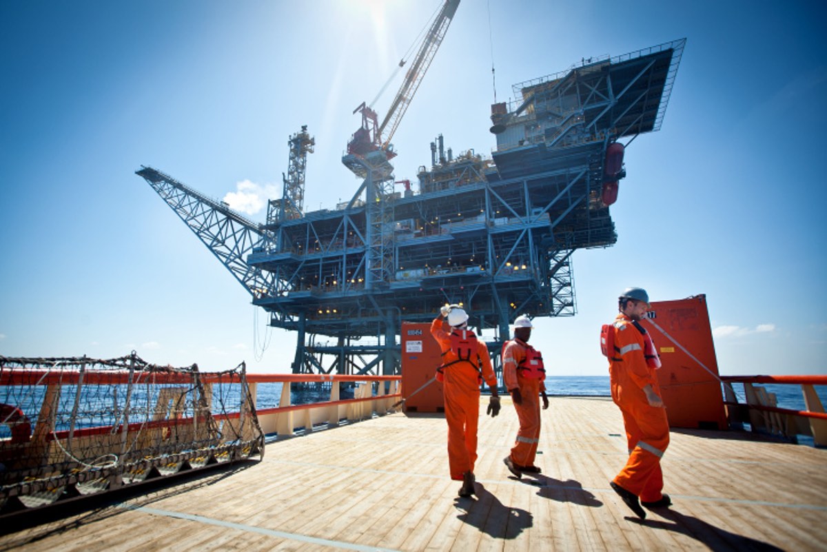 Workers on the Israeli Tamar gas processing rig off the coast of Ashkelon. Noble Energy and Delek are the main partners in the Tamar gas field, estimated to contain 10 trillion cubic feet of gas. June 23, 2014. Photo by Moshe Shai/Flash90.