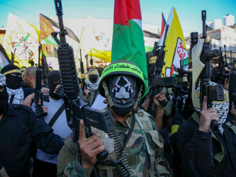 Palestinians from the al-Aqsa Martyrs Brigades of the Fatah movement participate in a rally of support for the Palestinian president Abbas, in Halhoul, 27 June 2021. Photo by Wissam Hashlamoun/Flash90