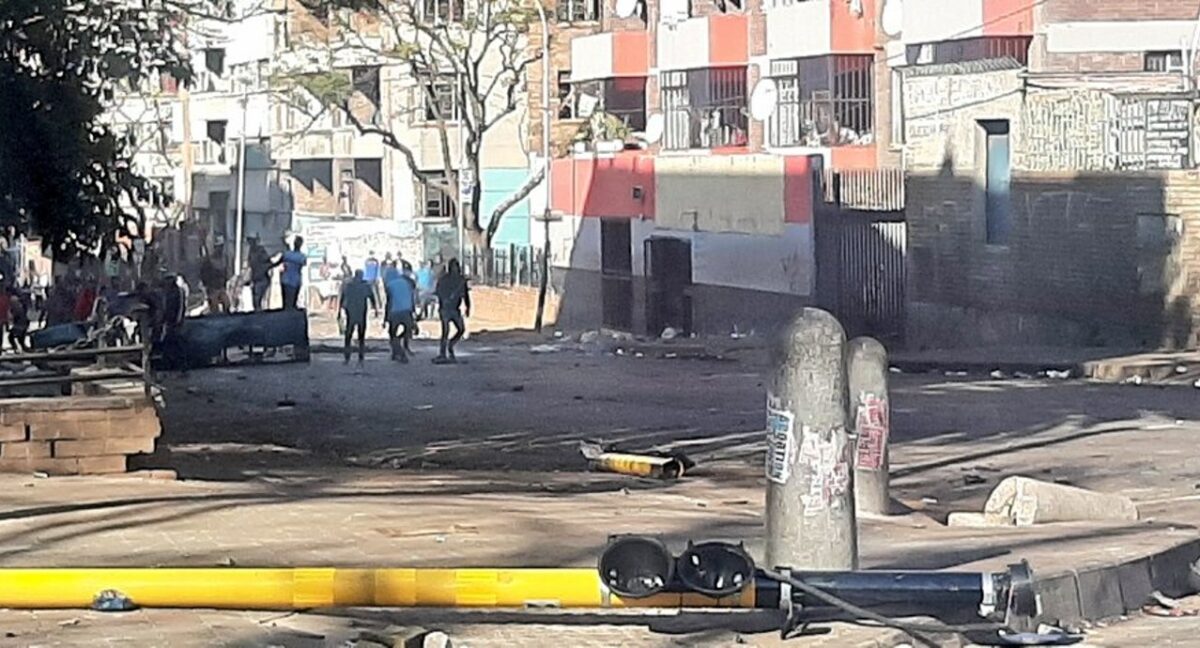 Sporadic protests in Jeppestown, Benrose, Denver, Berea & the JHB CBD. Several roads have been barricaded with burning tyres, rocks & debris. Protestors are marching in those areas. Officers on scene. Road users & members of the public are advised to avoid. #SaferJoburg; source: Joburg Metro Police, 11 July 2021.