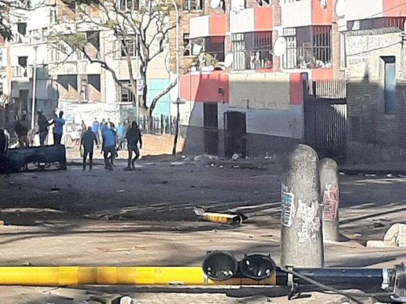 Sporadic protests in Jeppestown, Benrose, Denver, Berea & the JHB CBD. Several roads have been barricaded with burning tyres, rocks & debris. Protestors are marching in those areas. Officers on scene. Road users & members of the public are advised to avoid. #SaferJoburg; source: Joburg Metro Police, 11 July 2021.