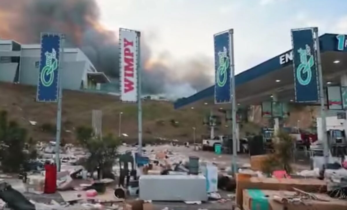 Destruction of businesses and property in KZN, South Africa. Screenshot.
