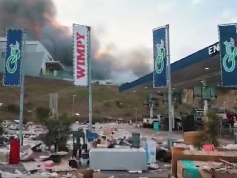 Destruction of businesses and property in KZN, South Africa. Screenshot.