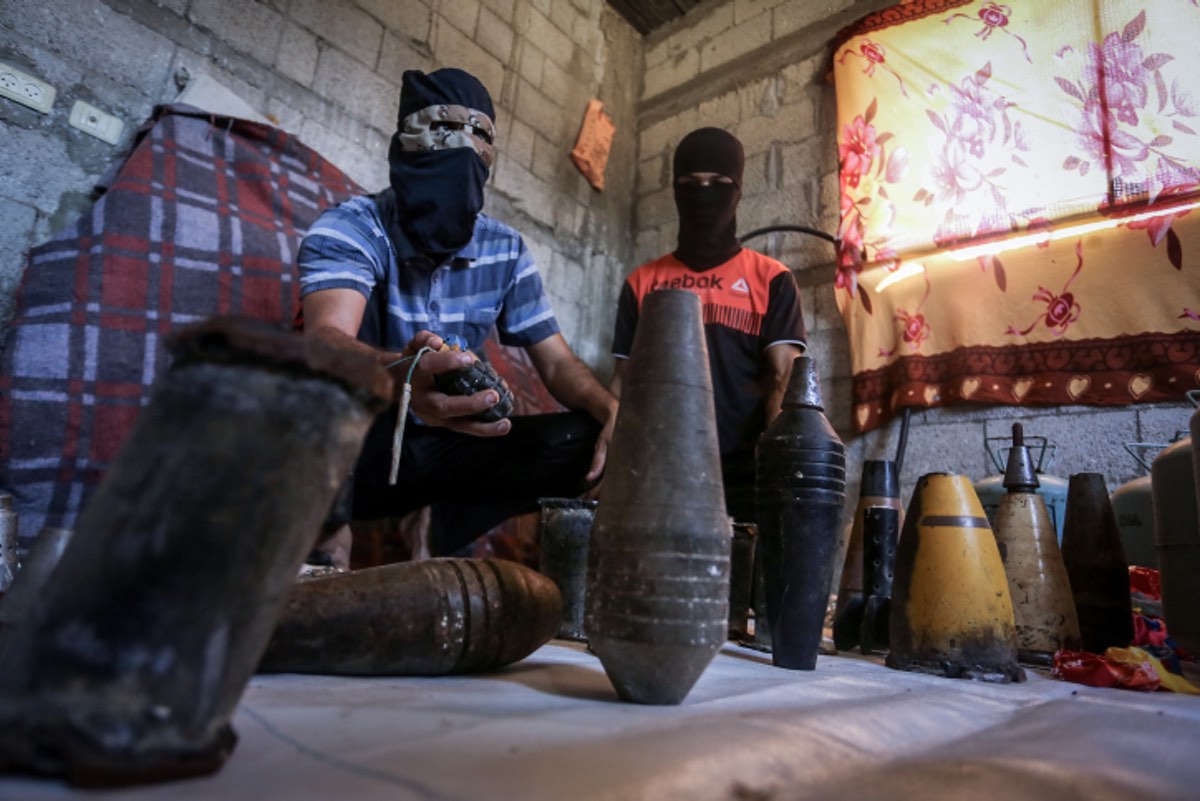 Palestinians prepare flammable materials and explosives to be attached to balloons and launched into Israel from Gaza, in Rafah, southern Gaza Strip, on Aug. 8, 2020. Photo by Abed Rahim Khatib/Flash90.