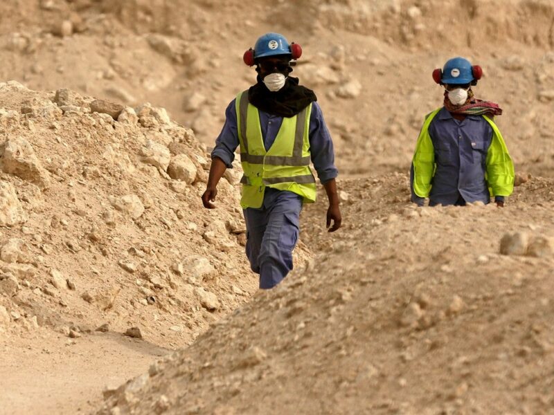 In this file photo taken during a government-organized media tour, workers walk back to the Al-Wakra Stadium worksite being built for the 2022 World Cup, in Doha, Qatar. (AP Photo/Maya Alleruzzo, File)