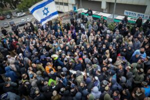 Family and friends attend the funeral of Yehuda Dimentman at Har HaMenuchot Cemetery in Jerusalem, on Dec. 17, 2021. Photo by Noam Revkin Fenton/Flash90.