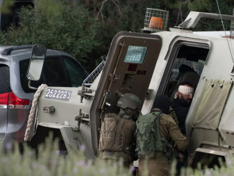 Israeli special forces arrest a Palestinian man outside Shavei Shomron, in Judea and Samaria, on Dec. 17, 2021, following a fatal terror attack near Homesh the night before. Photo by Sraya Diamant/Flash90.