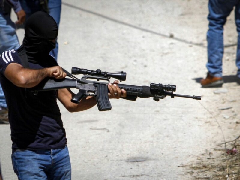 Palestinian gunmen from the Al-Aqsa Martyrs Brigades at the funeral of Malek Hamdan in the village of Salem near Nablus, May 15, 2021. Photo by Nasser Ishtayeh/Flash90.