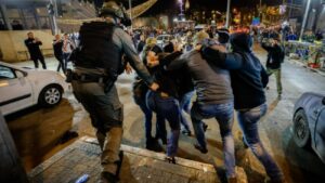 Palestinian rioters clash with Israel Police officers at the Damascus Gate in Jerusalem's Old City, April 3, 2022. Photo by Olivier Fitoussi/Flash90.