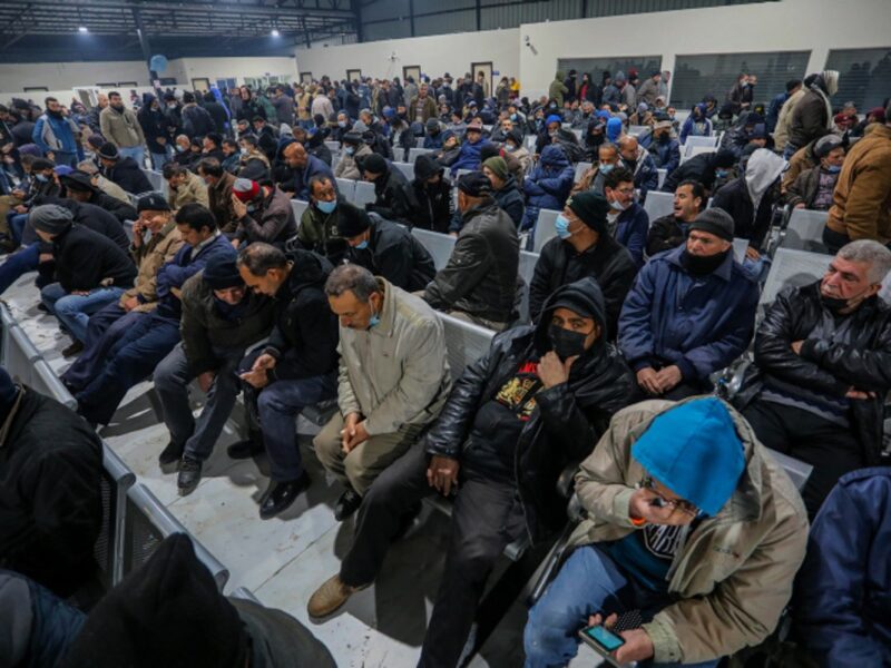 Palestinian workers wait at the Erez Crossing in Beit Hanun, in the northern Gaza Strip, as they wait to enter Israel for work, on March 13, 2022. Photo by Attia Muhammed/Flash90.