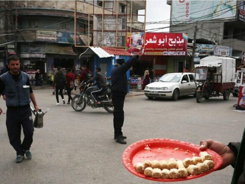 Palestinian supporters of Hamas pass out sweets in the street in Rafah in the Gaza Strip, following the terrorist attack where a Palestinian terrorist killed at least one man near Ariel, in the West Bank, on March 17, 2019. Photo by Abed Rahim Khatib/Flash90.