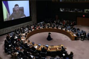 Ukraine President Volodymyr Zelensky addresses a Security Council meeting on Russia’s invasion via a video link. EPA-EFE/Peter Foley