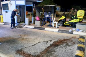 Israeli security and rescue personnel at the scene of a shooting attack at the entrance to Ariel, in Judea and Samaria, on April 30, 2022. Photo by Flash90.