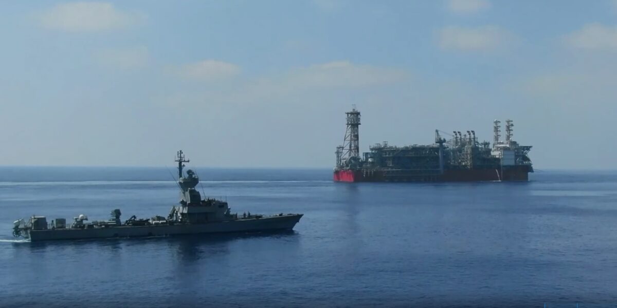 An Israeli warship sails near one of Israel's offshore natural gas rigs. Photo courtesy of the IDF Spokesperson's Unit.