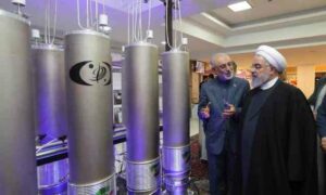 Ali Akbar Salehi, head of Iran’s Atomic Energy Organization, shows former Iranian President Hassan Rouhani models of nuclear centrifuges, April 9, 2019. Credit: Iranian President’s Office.