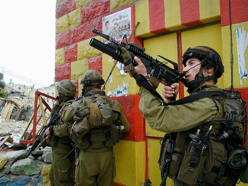 IDF soldiers in the Jenin refugee camp during "Operation Defensive Shield," April 9, 2002. Credit: IDF Spokesperson's Office.