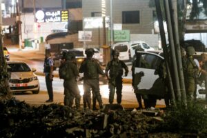 Security personnel secure the scene where Israeli soldiers shot a suspect in a vehicular attack, in Hawara, near Nablus, Sept. 22, 2022. Credit: Nasser Ishtayeh/Flash90