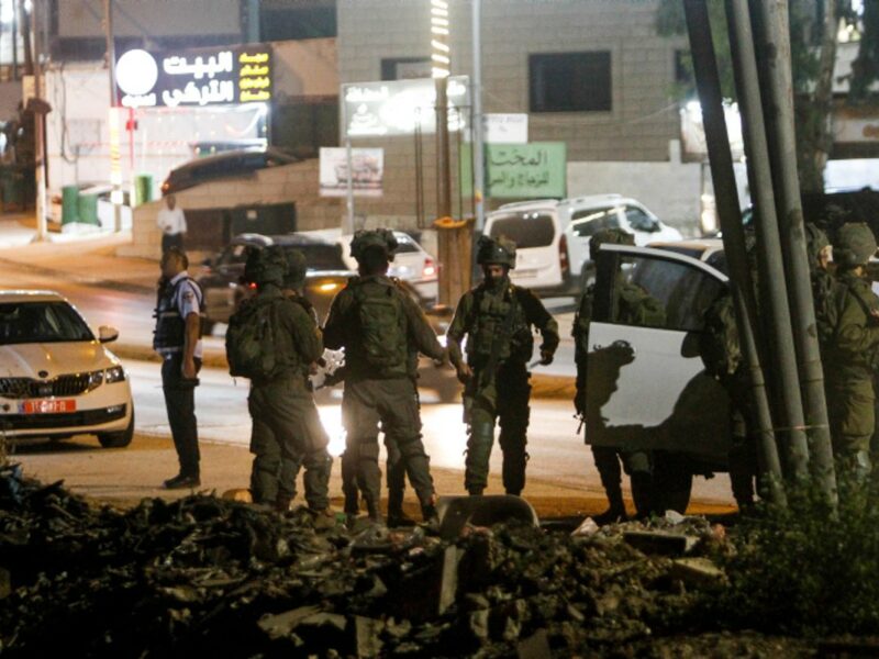 Security personnel secure the scene where Israeli soldiers shot a suspect in a vehicular attack, in Hawara, near Nablus, Sept. 22, 2022. Credit: Nasser Ishtayeh/Flash90