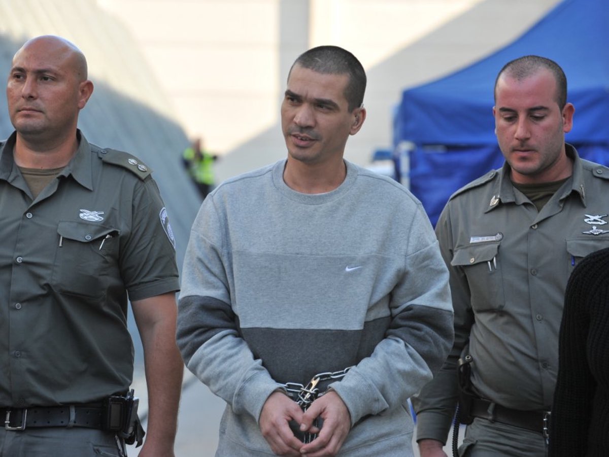 Itzhak Abergil during his extradition to the United States, 30 November 2011. Credit Israel Police. https://creativecommons.org/licenses/by-sa/3.0/