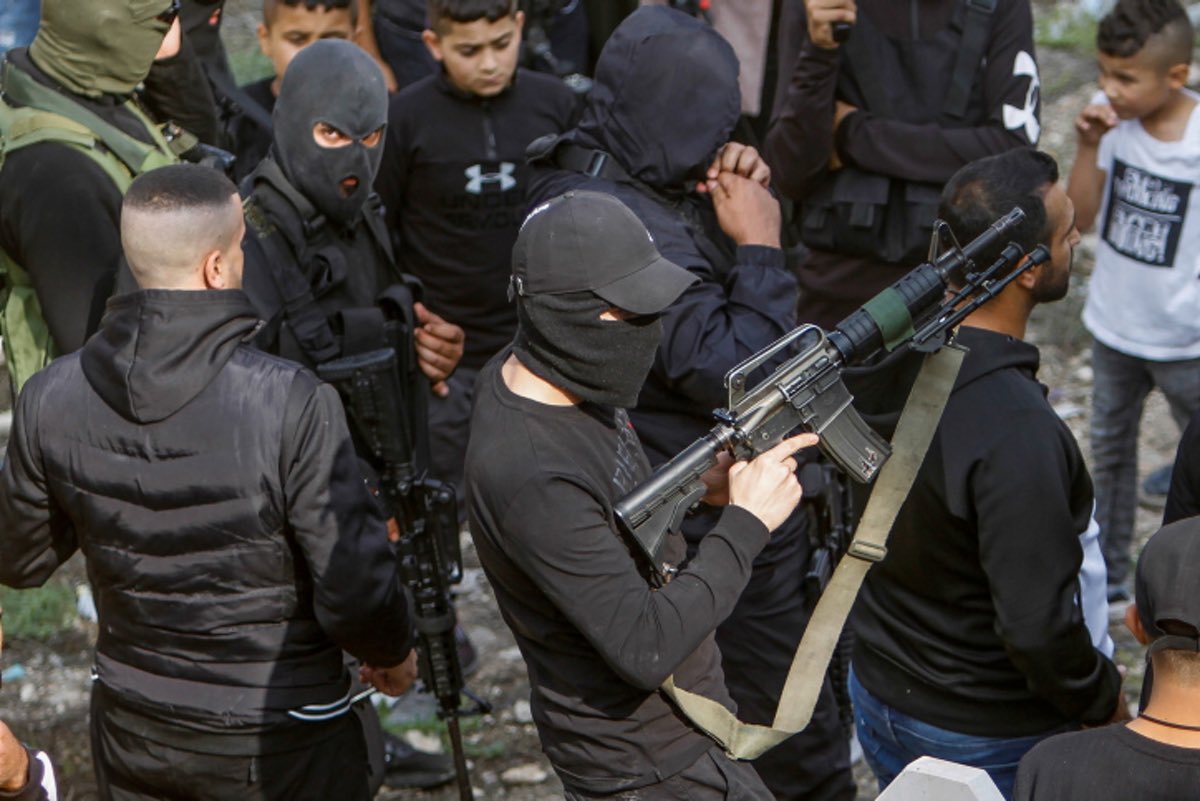 Palestinian terrorists and others attend the funeral of Raafat Ayassah, killed during clashes with Israeli security forces, in Sanur, near Jenin, Nov. 10, 2022. Photo by Nasser Ishtayeh/Flash90.