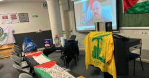 Hezbollah flag flies at University of Cape Town event held by the Palestine Solidarity Forum. Photo- South African Zionist Federation SAZF